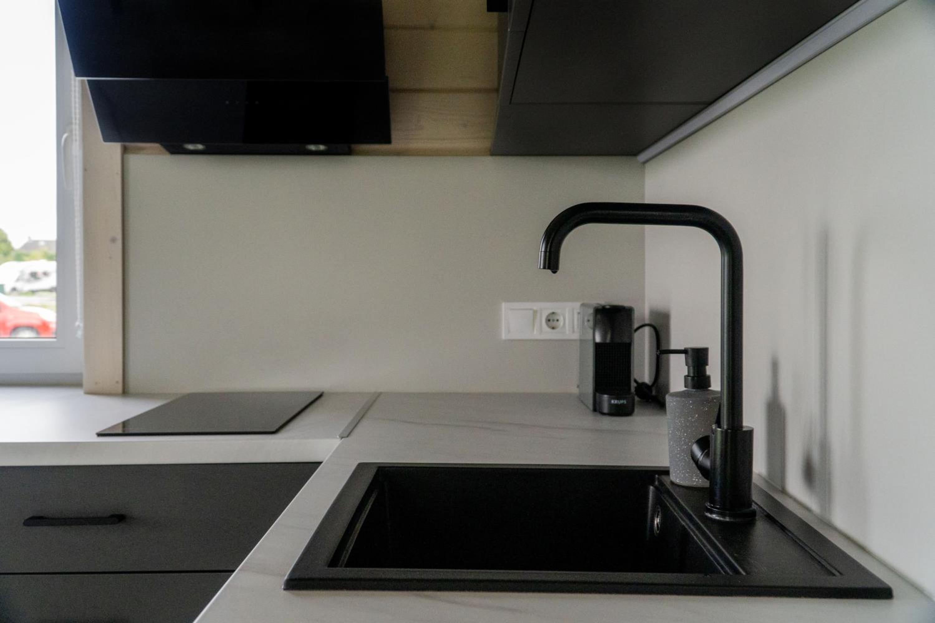 Tiny house aan het water op de appelhof view 4