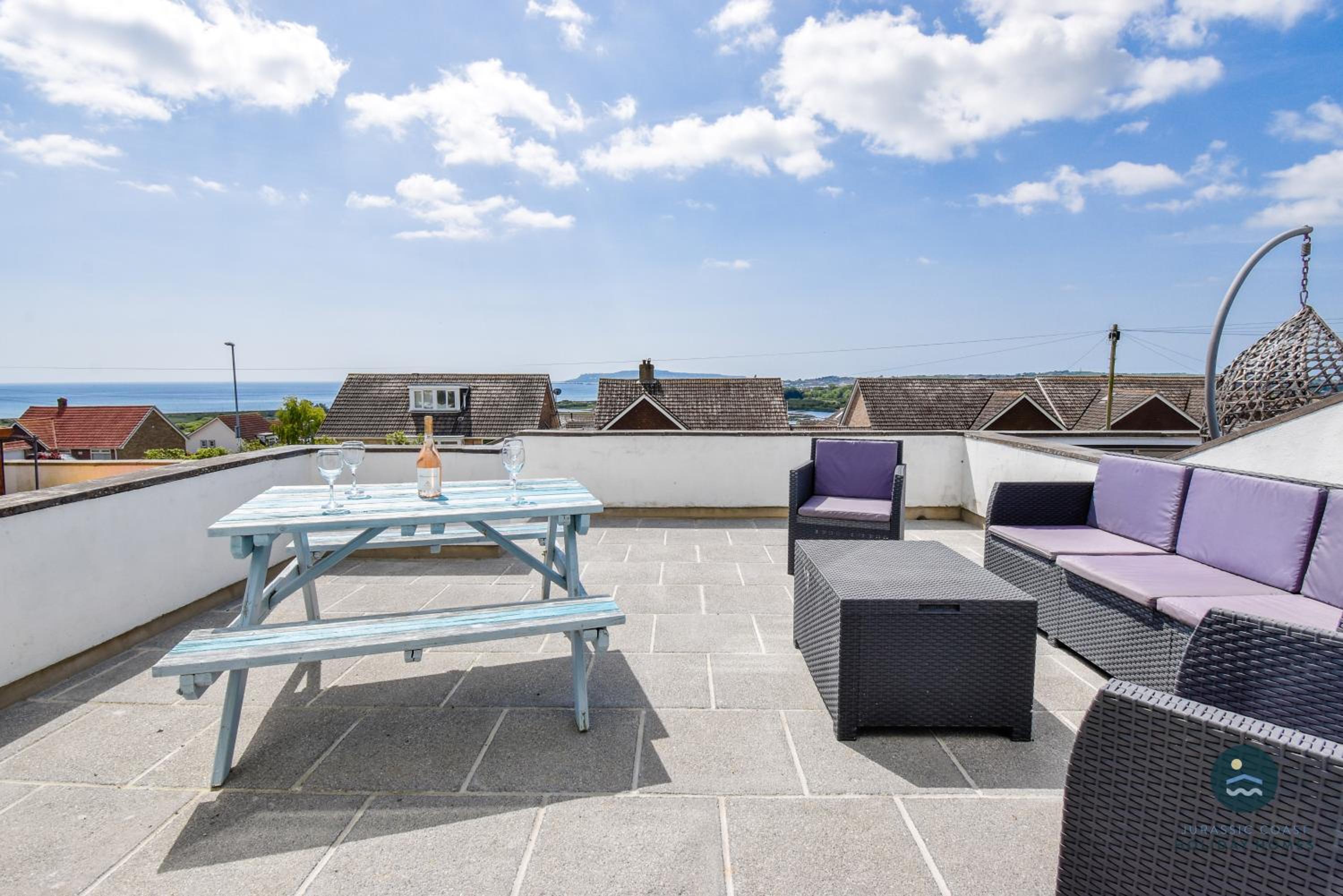Pebble House - Sea views parking family friendly view 2