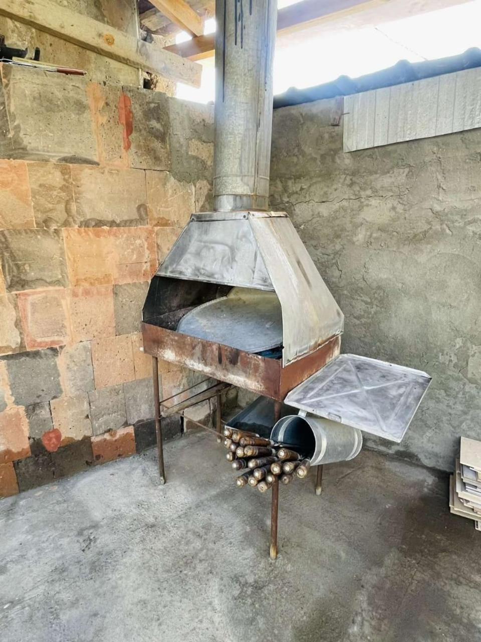small house with the garden and BBQ