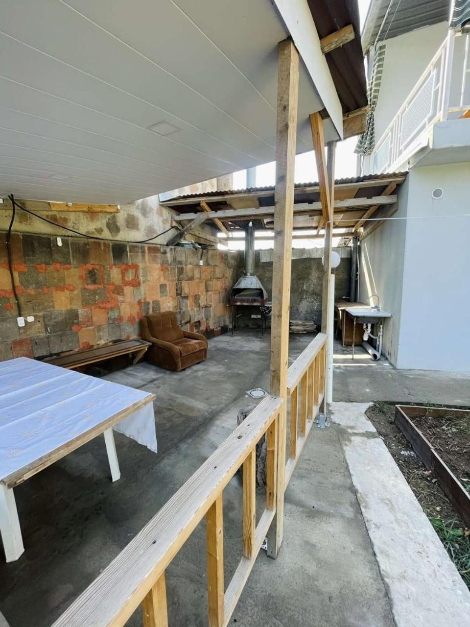 small house with the garden and BBQ