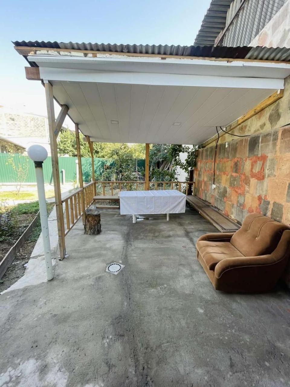 small house with the garden and BBQ