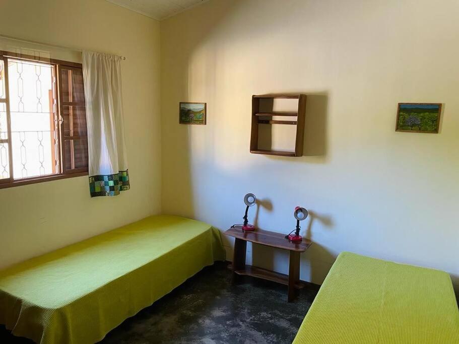 Casa com cachoeiras e contato com a natureza