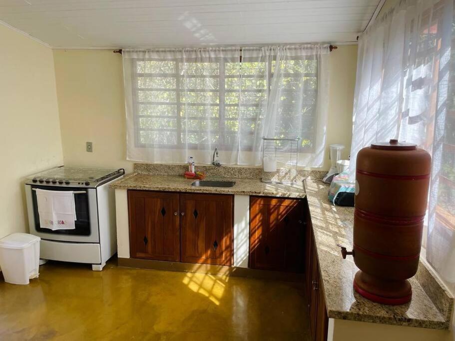 Casa com cachoeiras e contato com a natureza