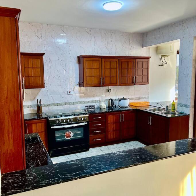 Family Friendly Spacious 3BR Near Beach With Pool & Gym view 3