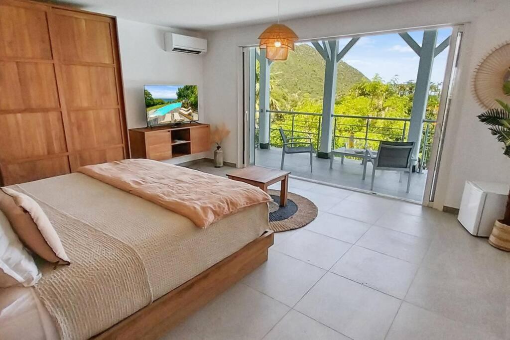 7 bedrooms Villa, Nestled in the heights of Anse Marcel, one of the most discreet bays of the island. view 2