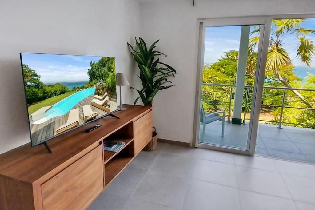 7 bedrooms Villa, Nestled in the heights of Anse Marcel, one of the most discreet bays of the island. view 3