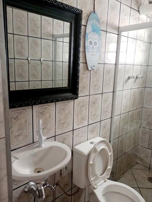 Casa espaçosa com piscina e garagem - Caraguatatuba