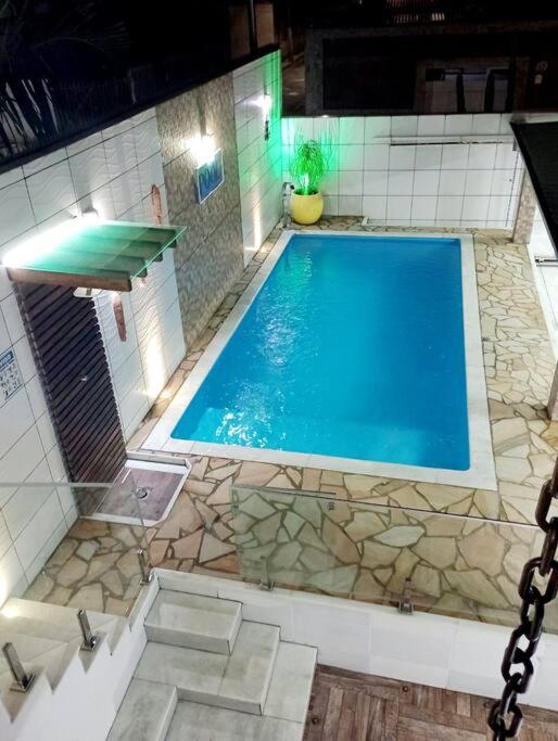 Casa espaçosa com piscina e garagem - Caraguatatuba