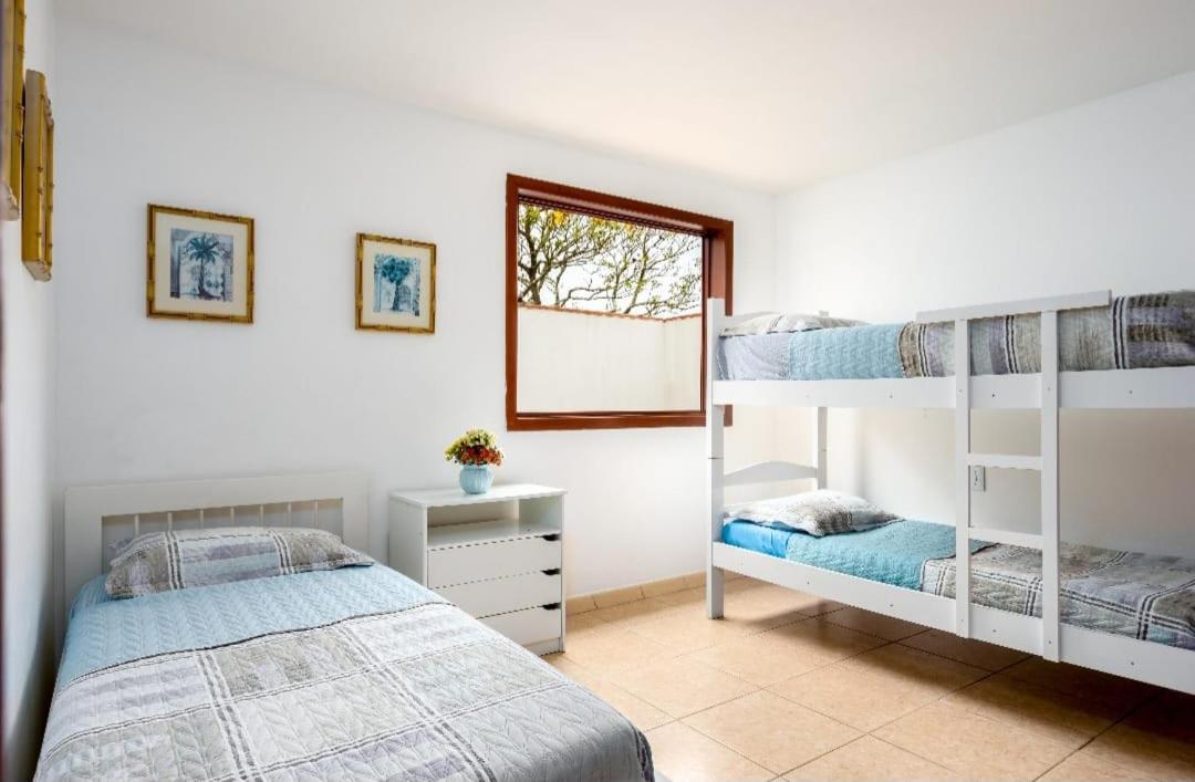 Casa com piscina frente ao mar Praia do Santinho