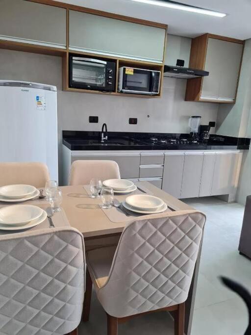 condominio clube com piscina climatizada com fechamento em vidro - Vila Caiçara - Praia Grande