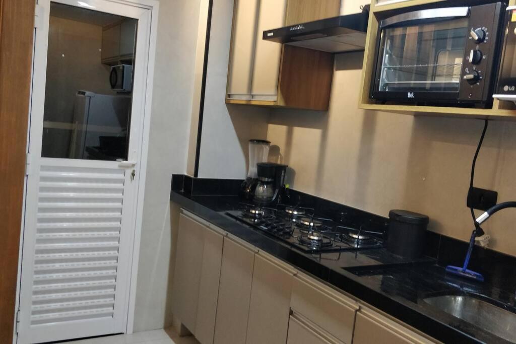 condominio clube com piscina climatizada com fechamento em vidro - Vila Caiçara - Praia Grande
