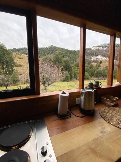 Espíritus del Cañi. Tiny home y destilería