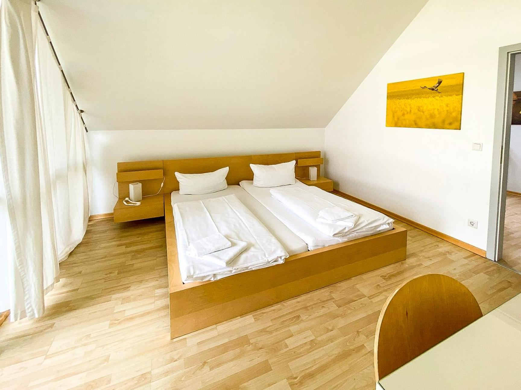 Ferienhaus Wiesengeflüster S1 - mit Sauna, Kamin und Workation an der Müritz