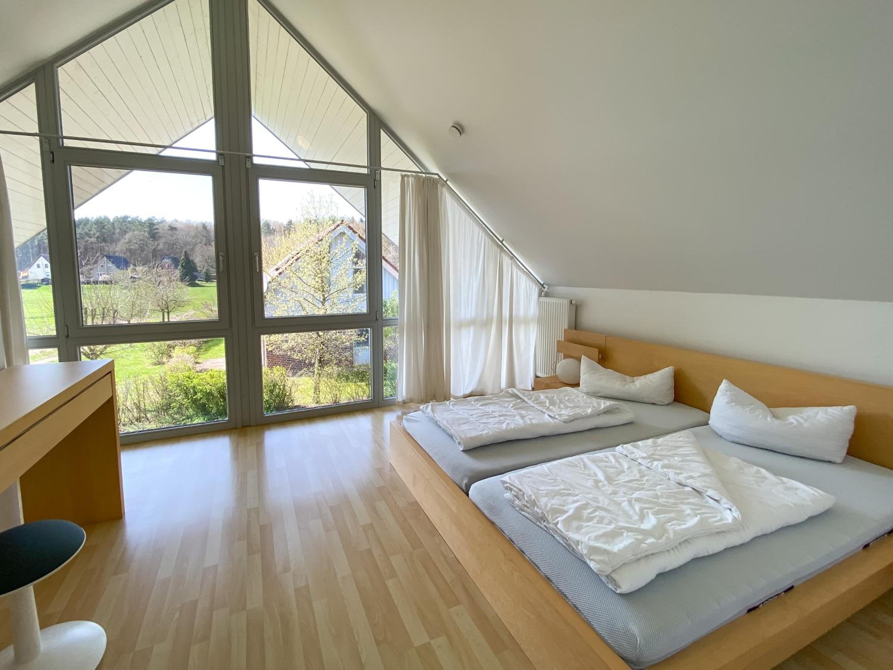 Ferienhaus Wiesengeflüster E5 - gruppenfreundlich in Randlage mit Fasssauna