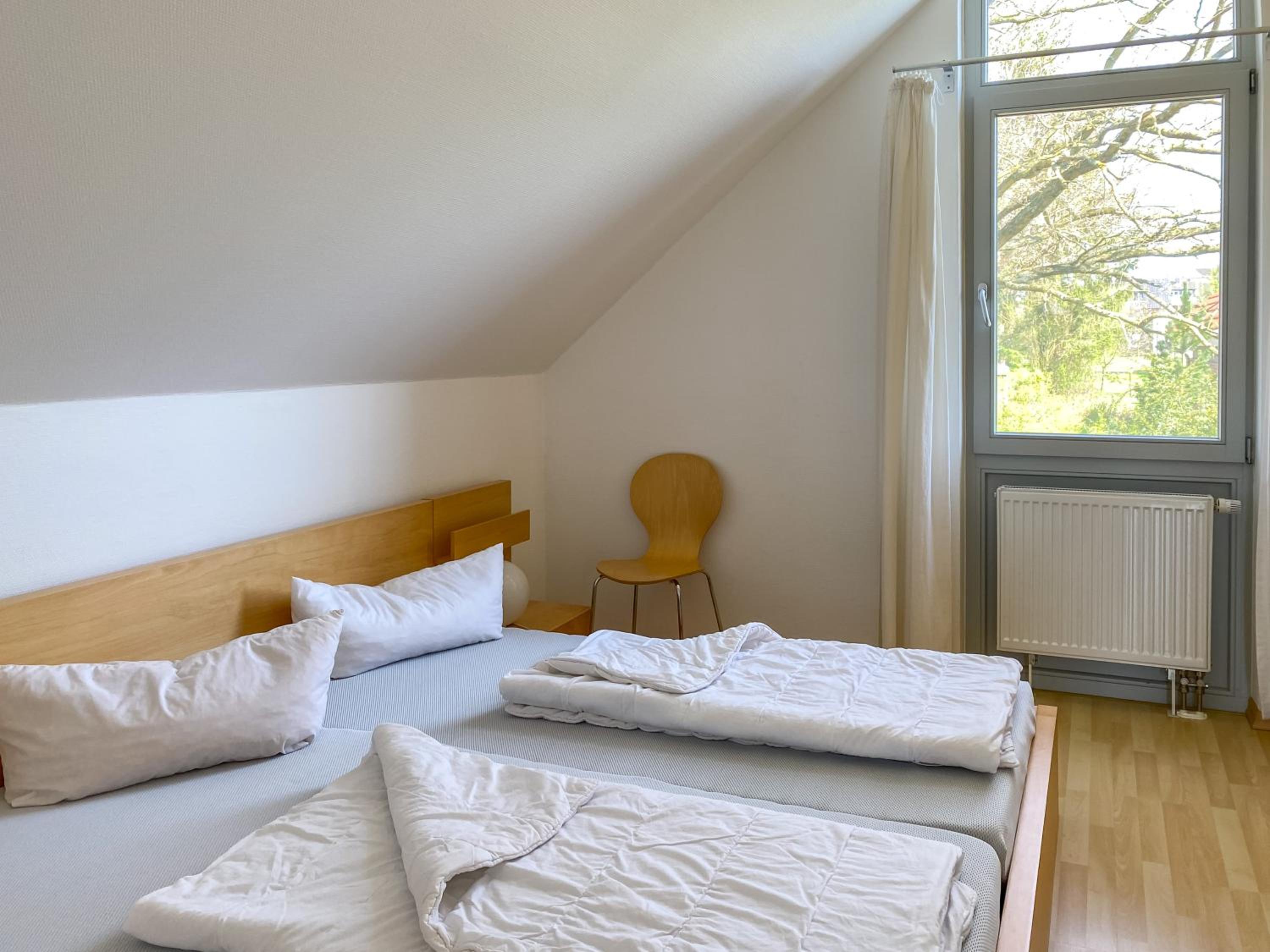 Ferienhaus Wiesengeflüster E5 - gruppenfreundlich in Randlage mit Fasssauna
