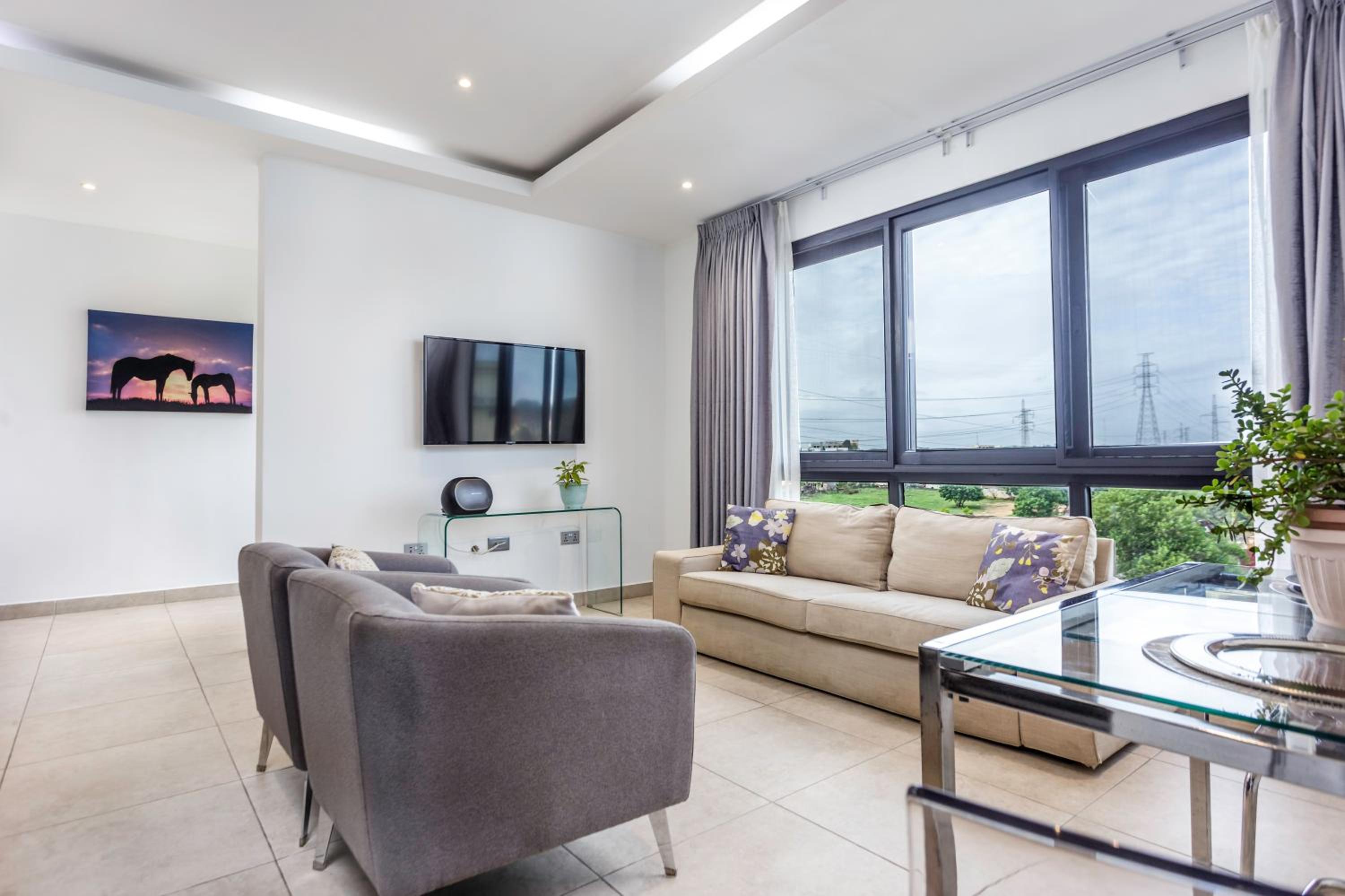 Adinkra Suites at Legacy Apts view 5