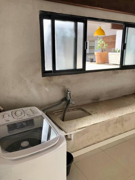 Casa com piscina e churrasqueira