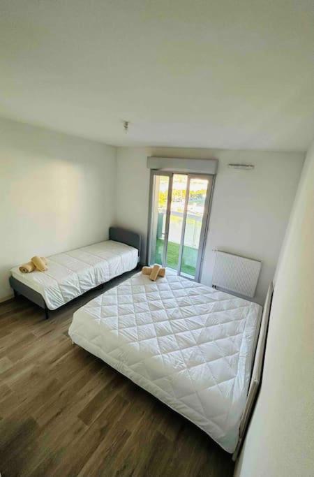 Appartement T2 + parking privatif - Centre ville