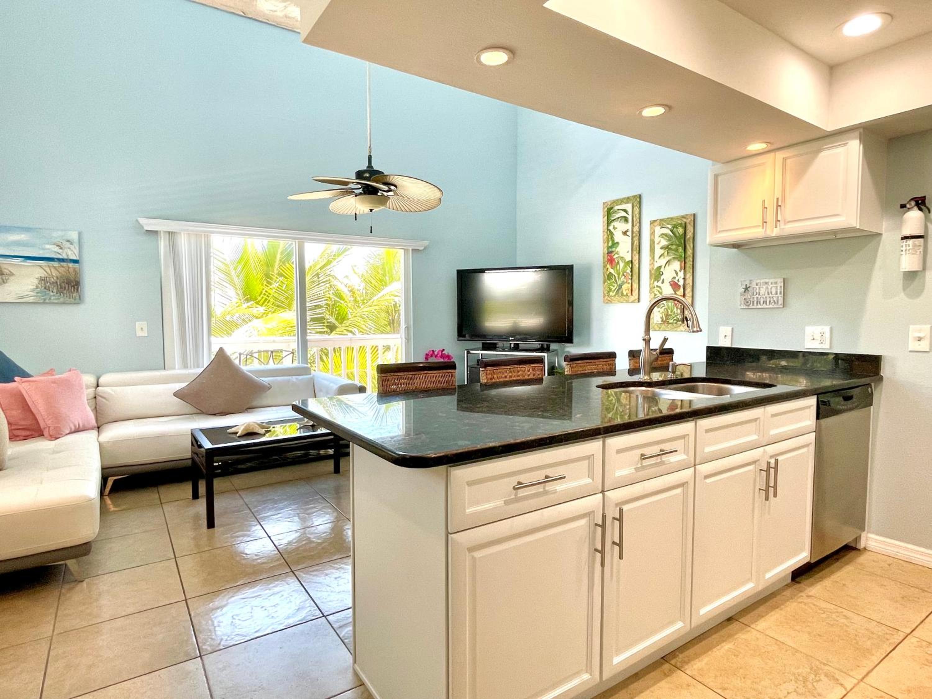 Two story condo with ocean on one side and bay on other only steps away view 4
