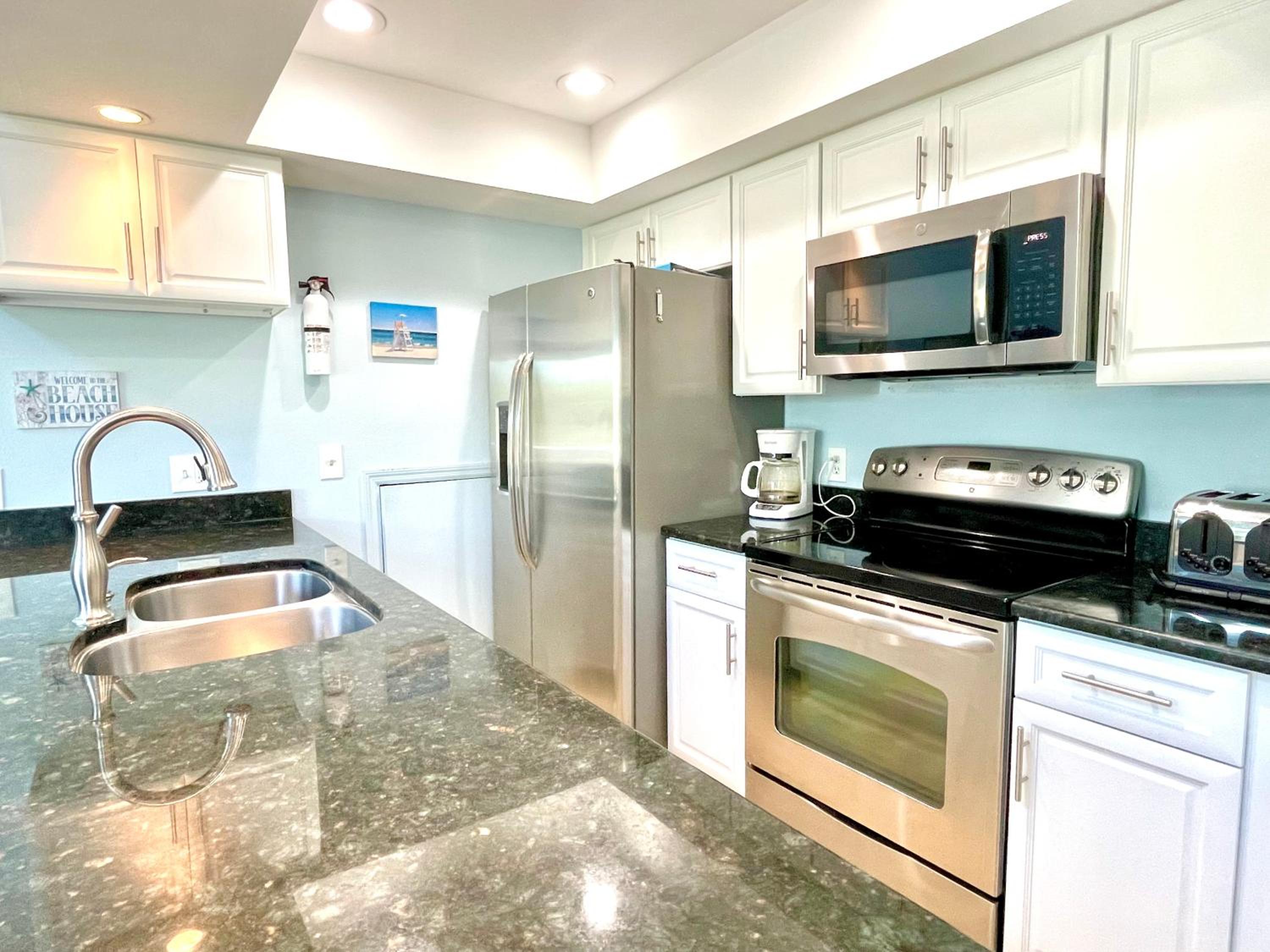 Two story condo with ocean on one side and bay on other only steps away view 5