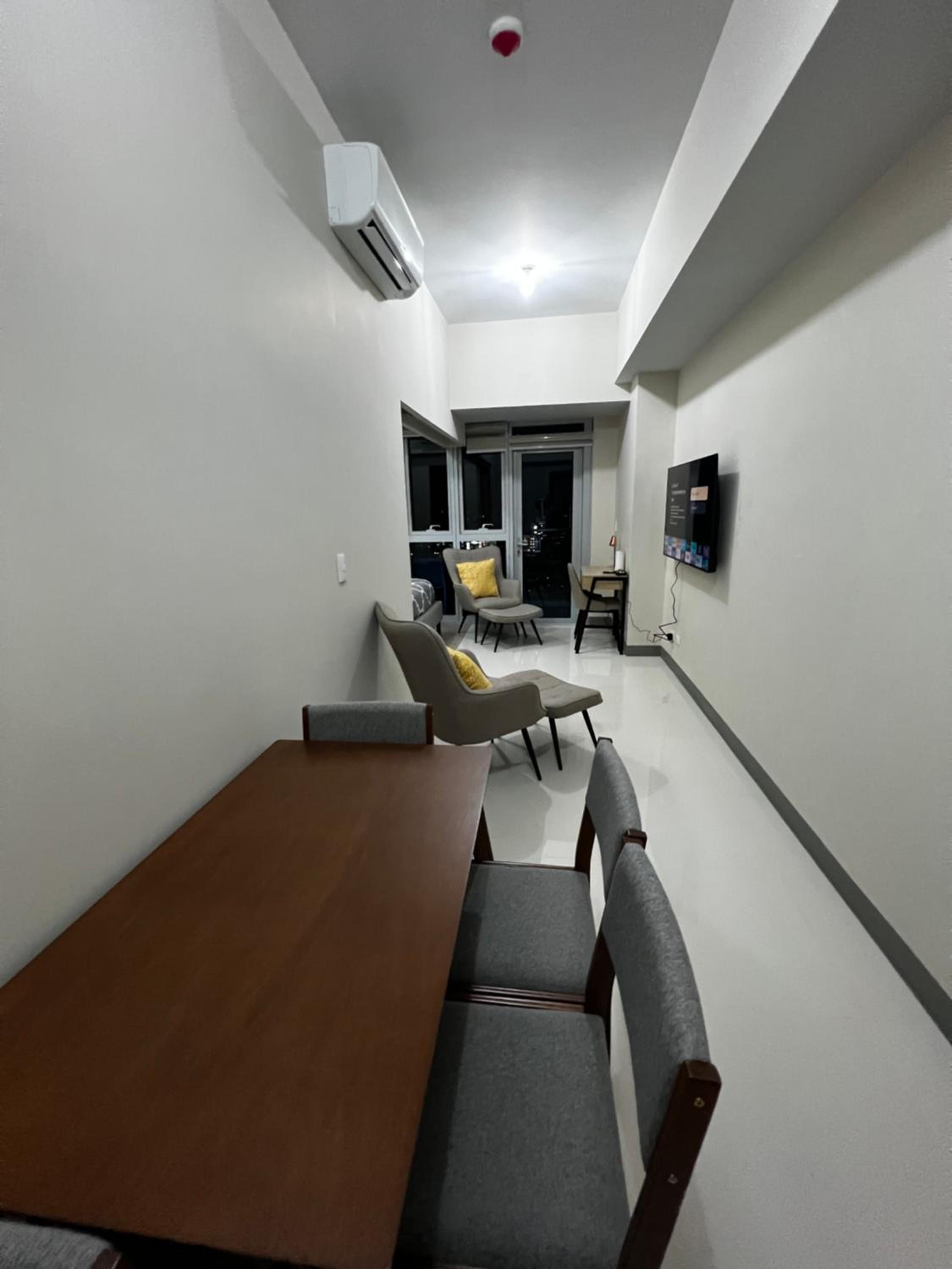 1 br Uptown BGC condo with balcony view 2