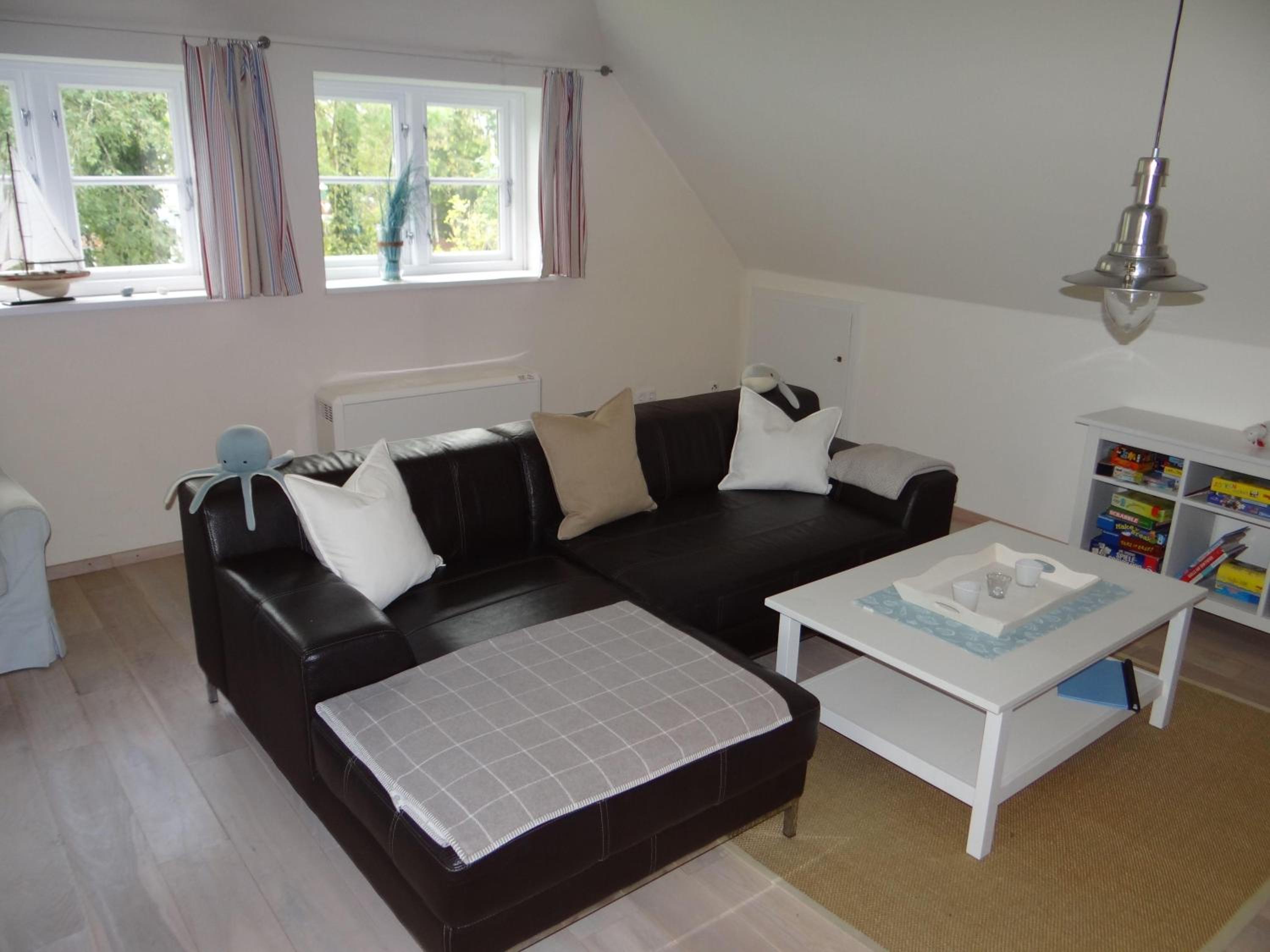 Ferienwohnung-DG-im-Reetdachhaus-im-Ort-Welt