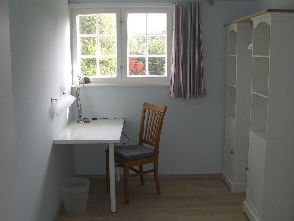 Ferienwohnung-DG-im-Reetdachhaus-im-Ort-Welt