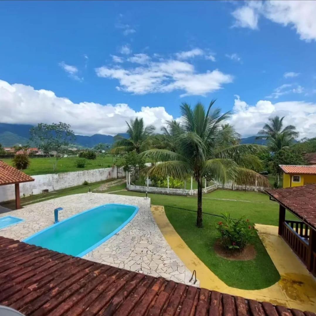 Charmosa Casa com 06 suítes na praia, beira rio Juqueriquere com rampa para barcos e jet sky