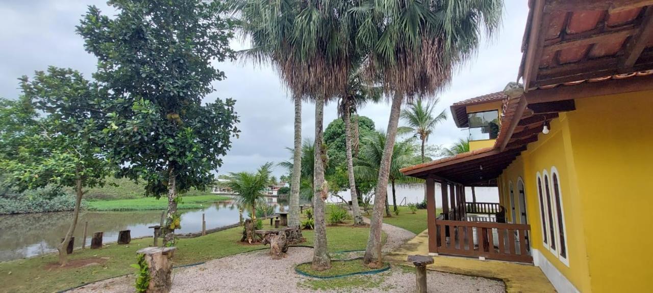 Charmosa Casa com 06 suítes na praia, beira rio Juqueriquere com rampa para barcos e jet sky