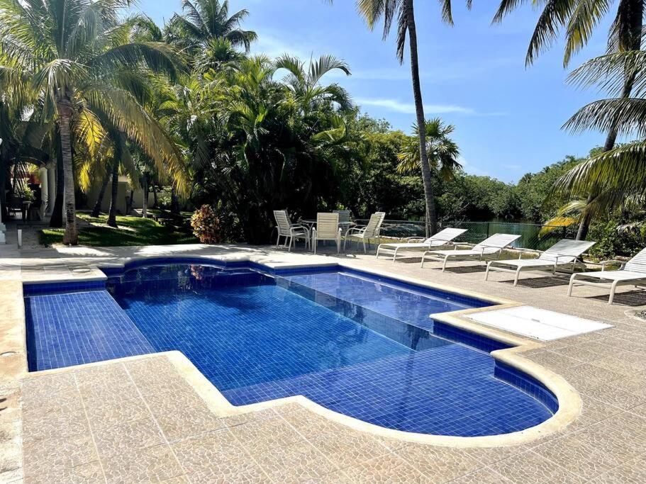 5BR Waterfont Private Villa with Pool & Gardens by Solmar Rentals