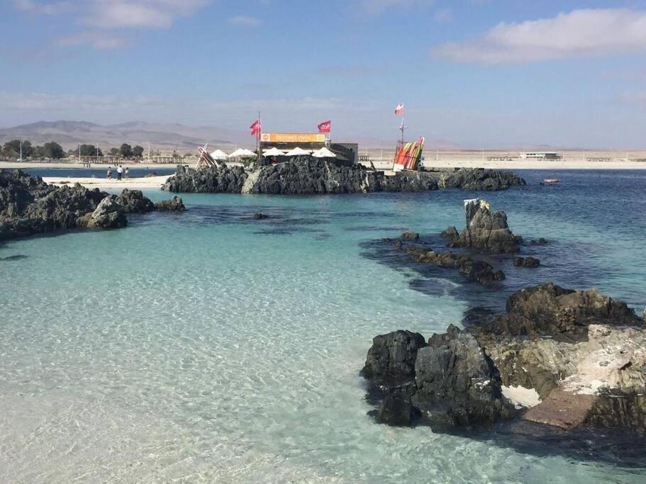 Casa de dos pisos a pasos de la playa