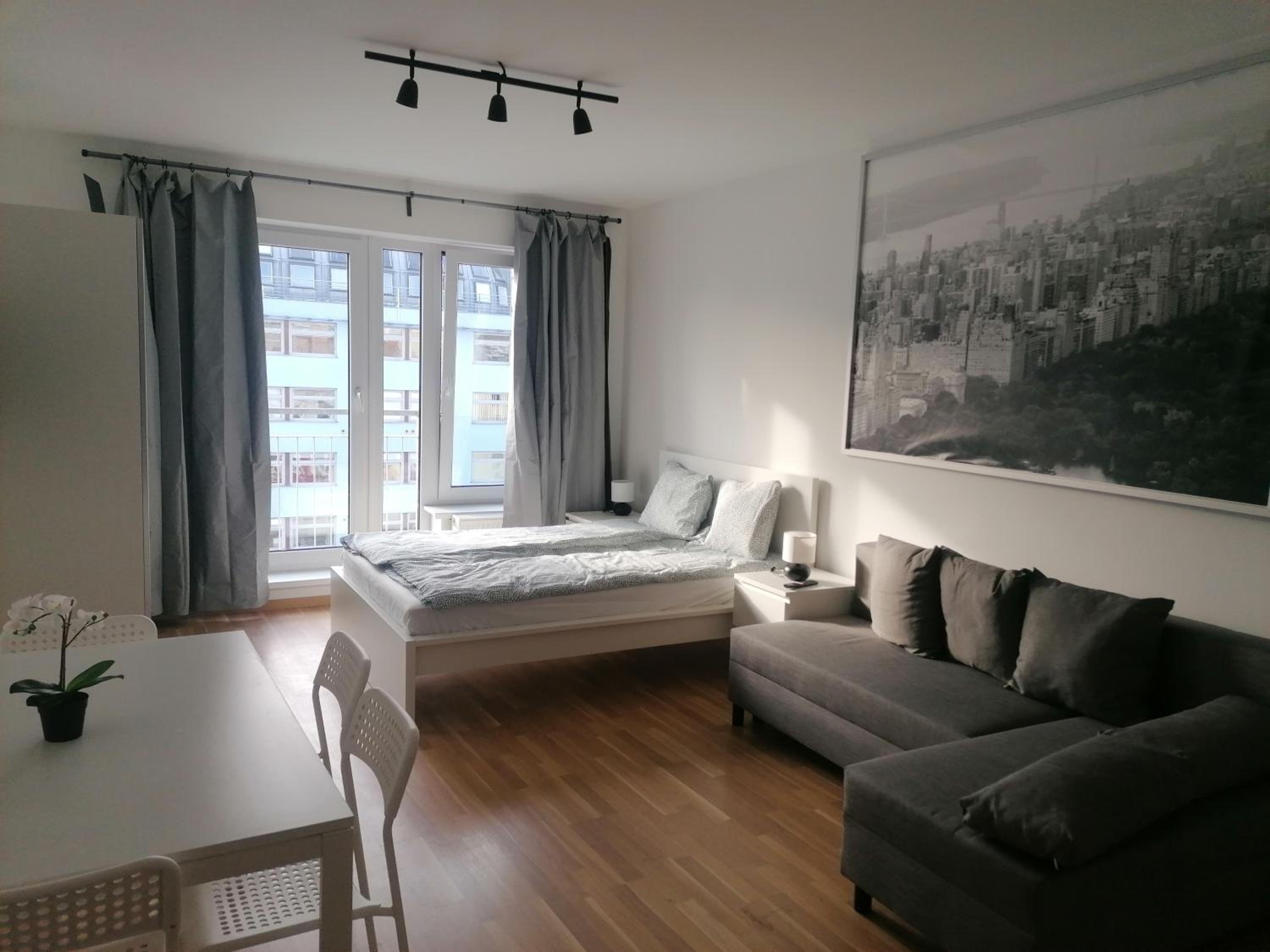 Brand new studio apartment #71 with free secure parking in the center