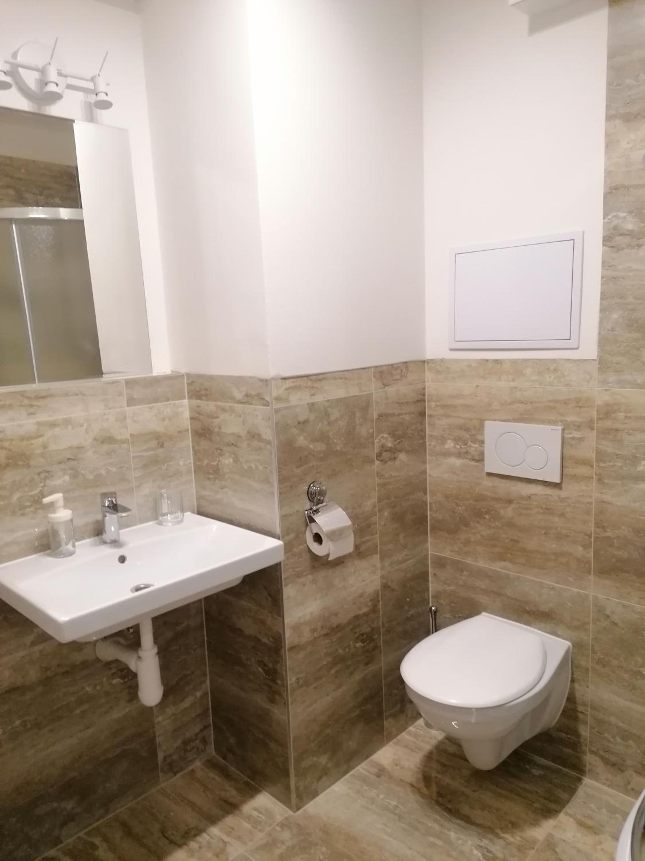 Brand new studio apartment #71 with free secure parking in the center