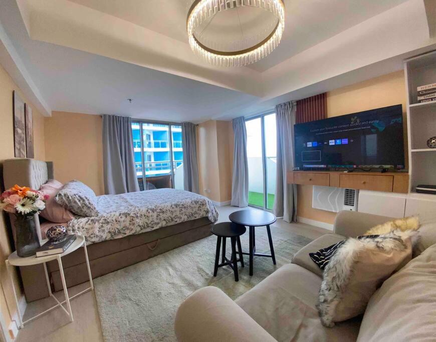 1BR-MonteCarloBliss by The Bali Corner at Azure North, 25th Floor, Full view of Beach Resort Amenities view 5