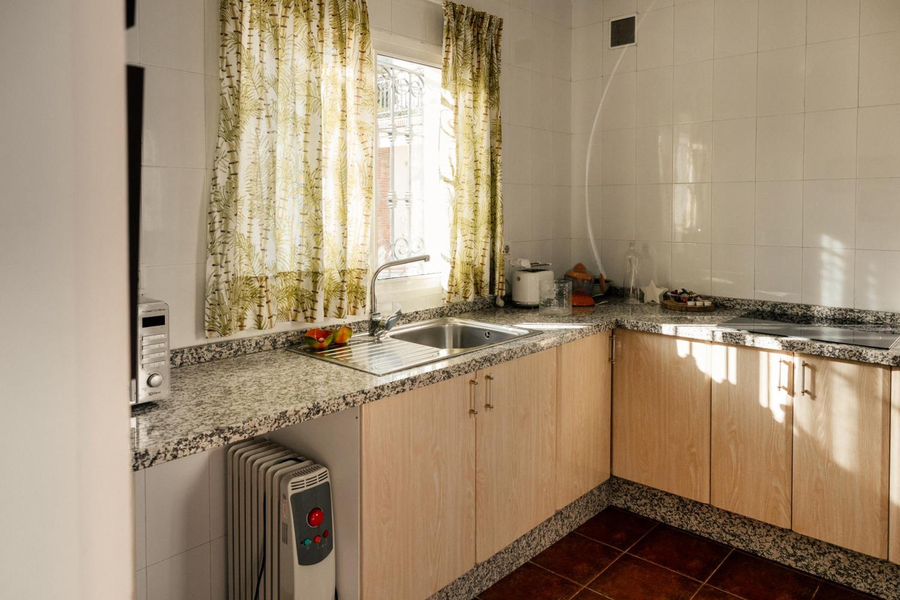 Agradable casa con jardín privado