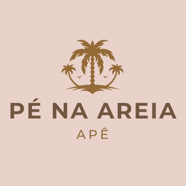 Ap prédio frente mar/pé na areia