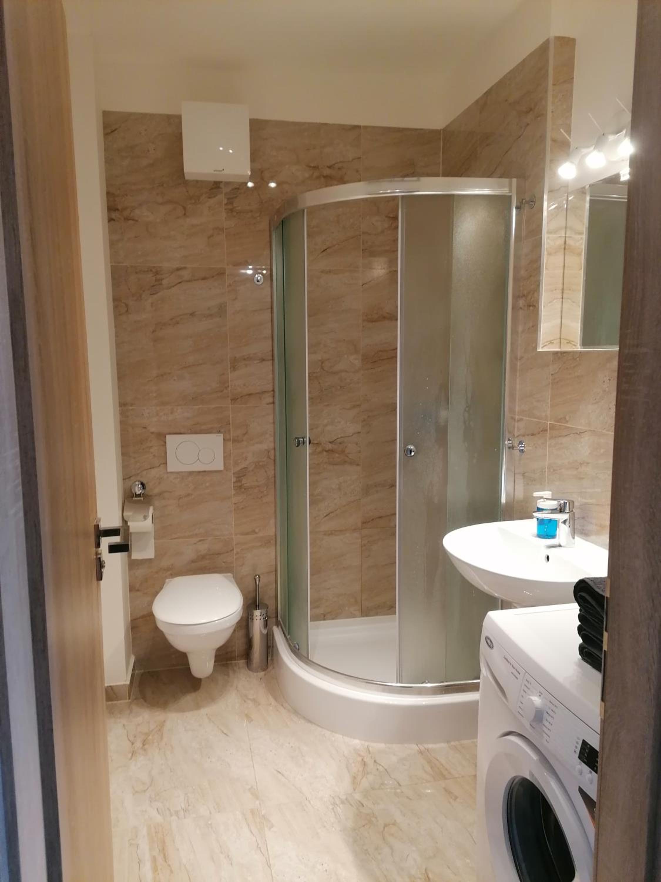 Brand new studio apartment # 45 with free parking in the city center