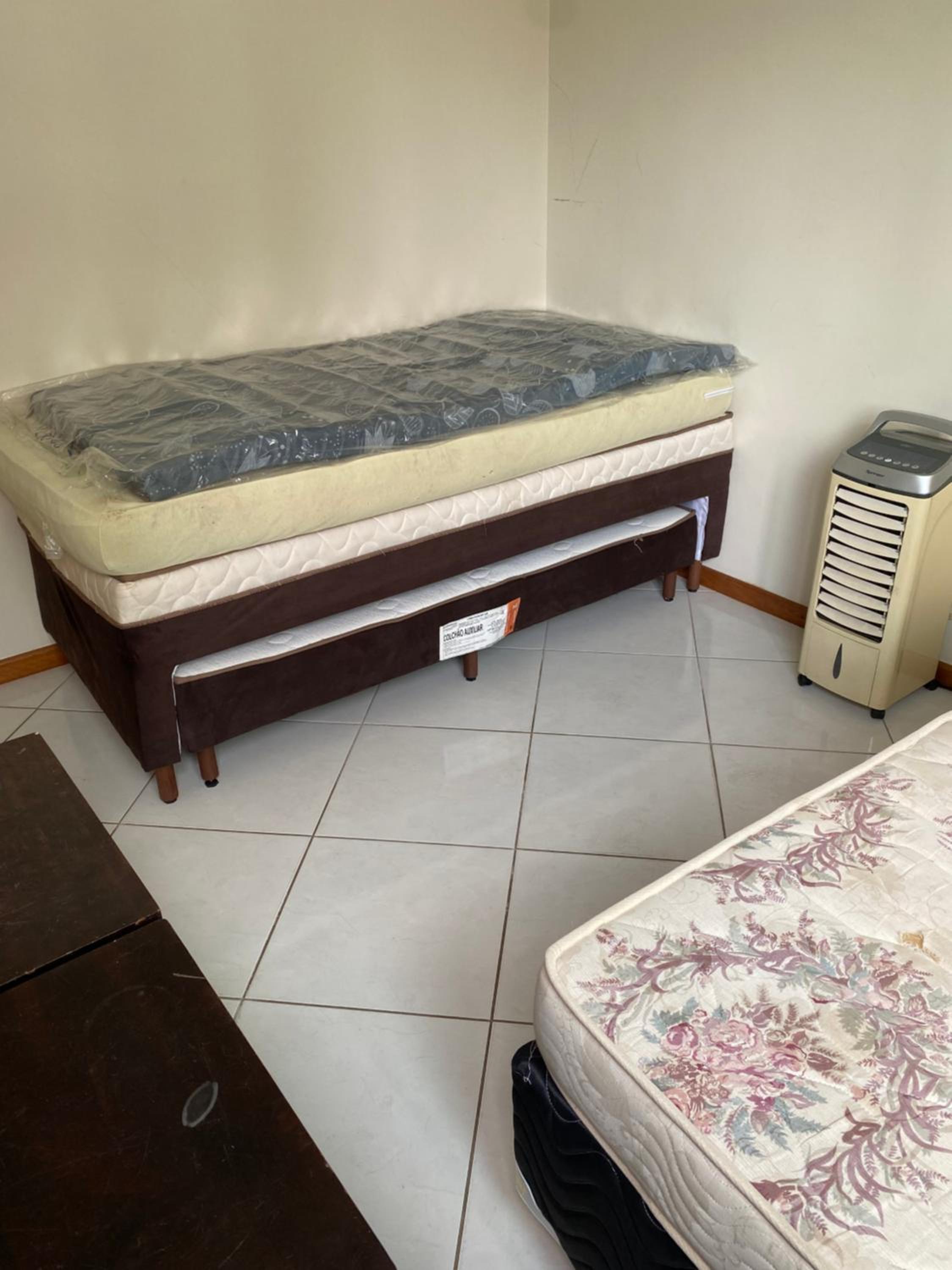 Ap prédio frente mar/pé na areia