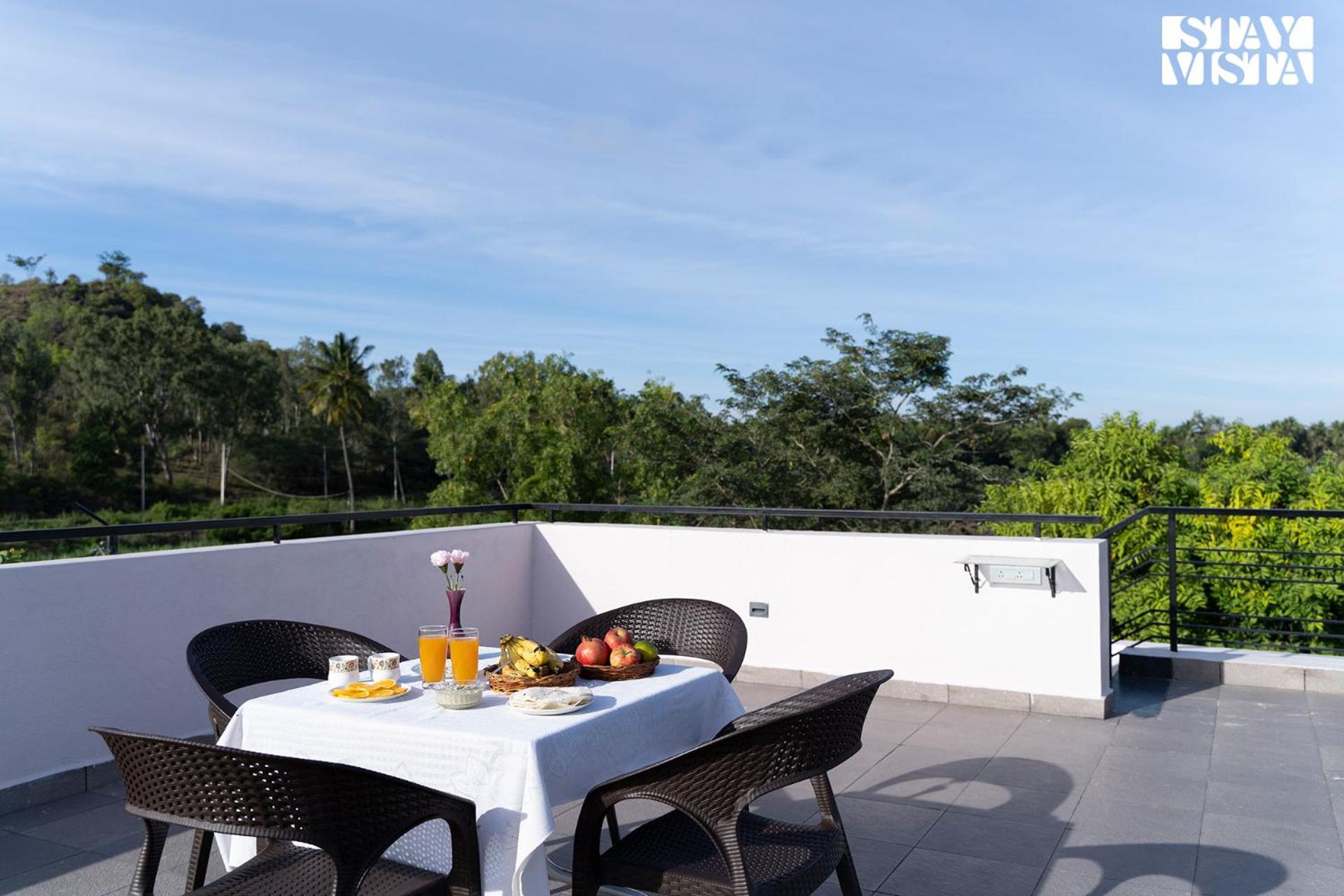 StayVista at Ava - The Country House with Breakfast & Miniature Golf view 4