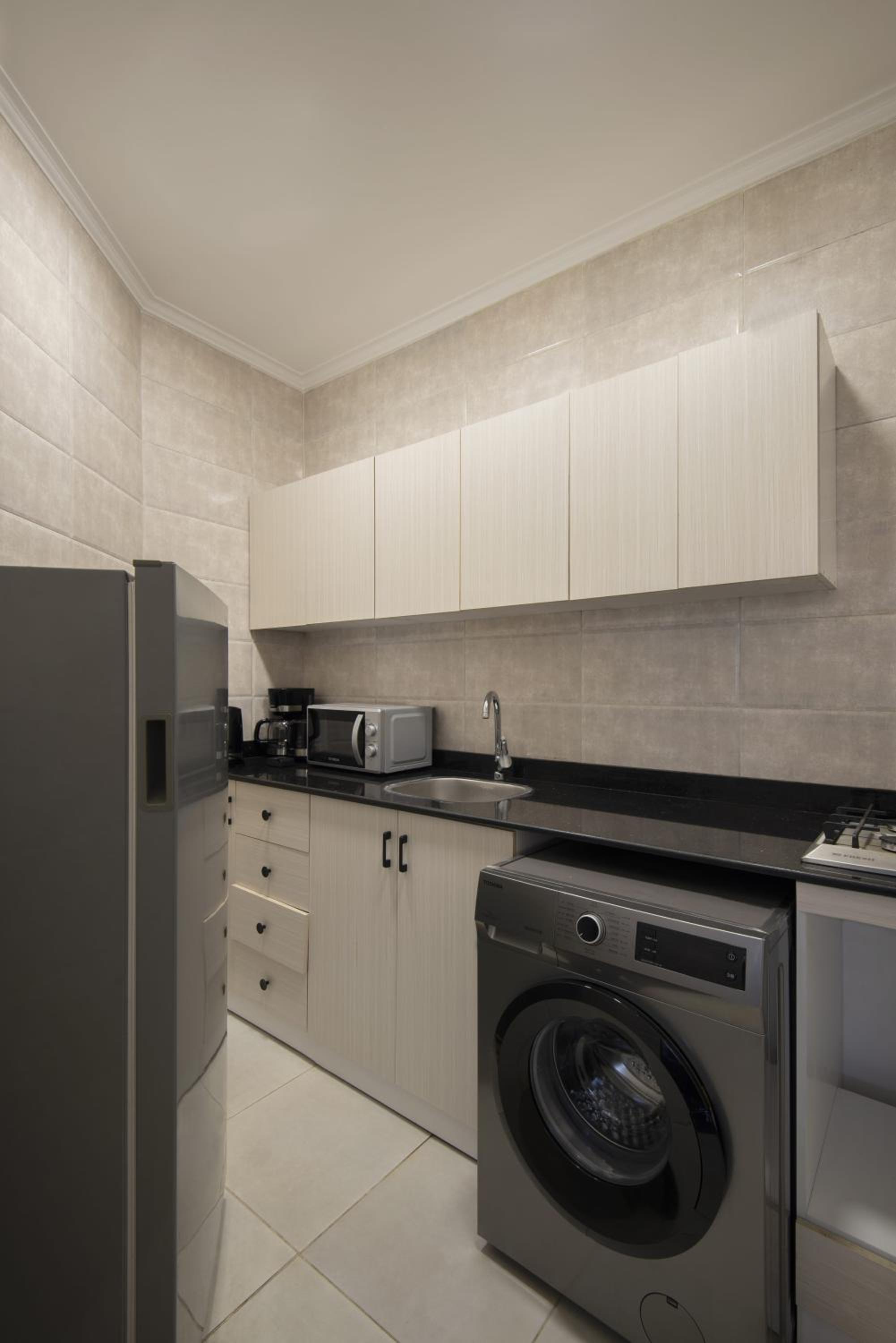 Travelholic AUC Residence