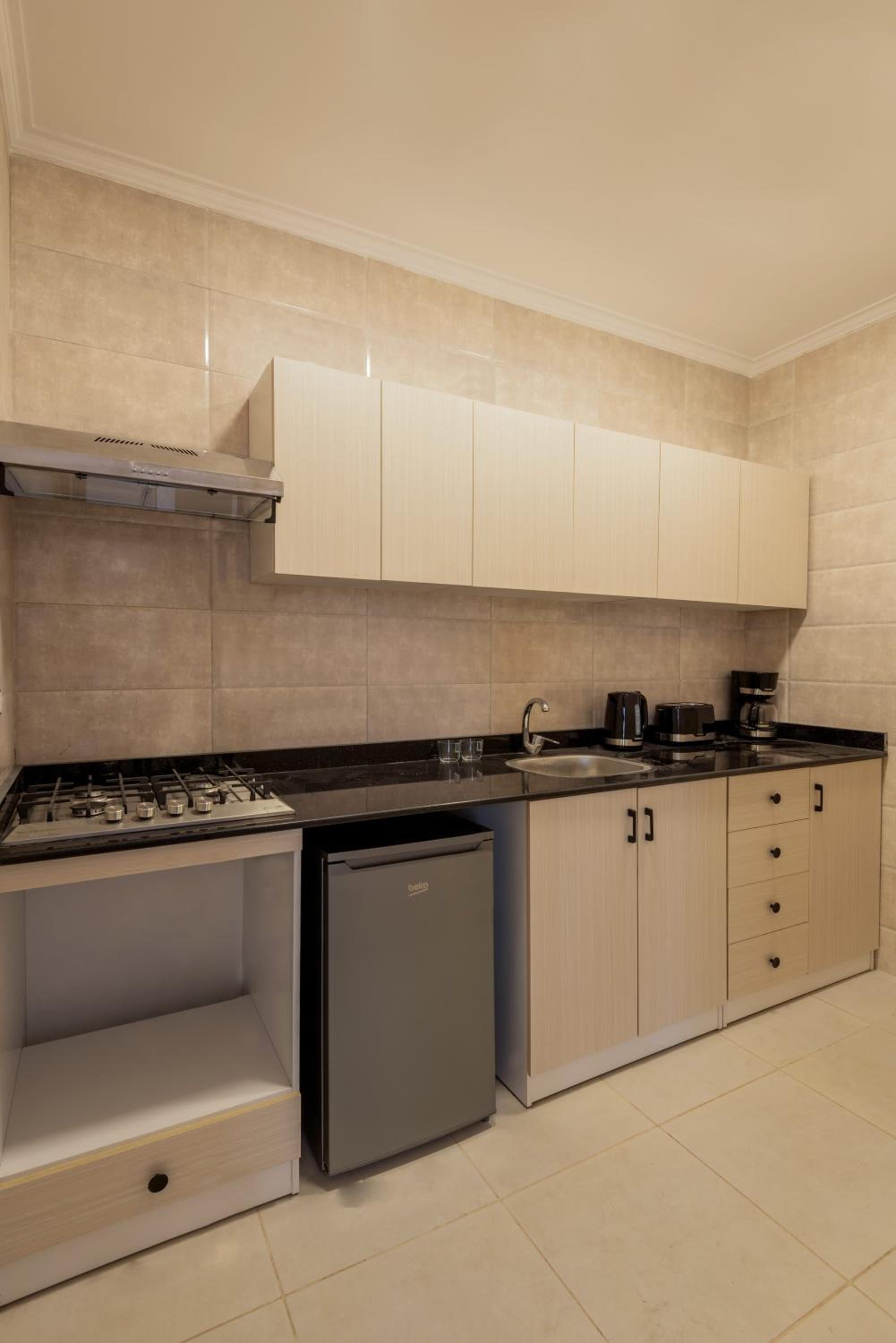Travelholic AUC Residence