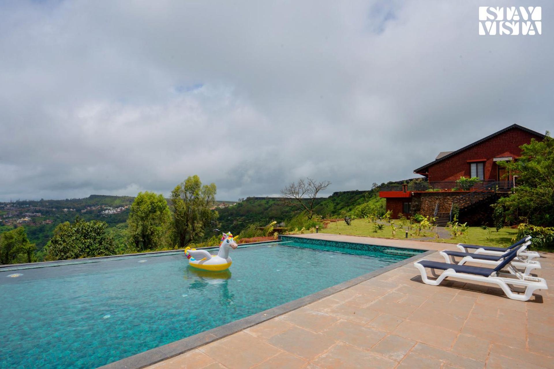 StayVista's Whistling Thrush - Valley-View Villa with Outdoor Deck, Infinity Pool, Gym, Sauna, and Steam Room view 3