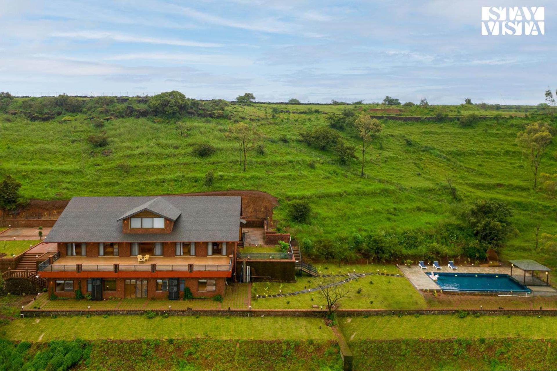 StayVista's Whistling Thrush - Valley-View Villa with Outdoor Deck, Infinity Pool, Gym, Sauna, and Steam Room view 2