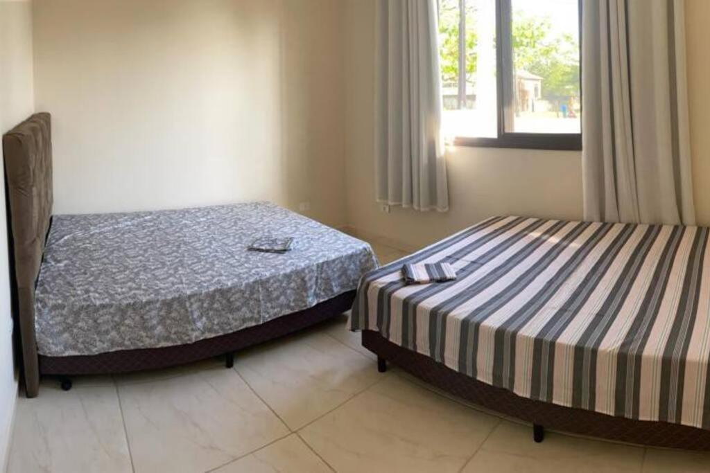 Com piscina. Casa para família.