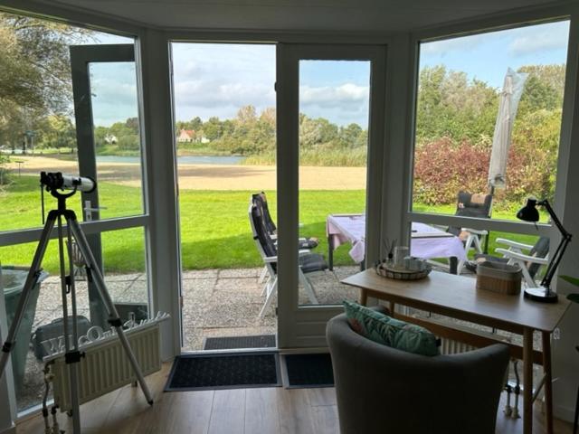 Gezellige vakantiewoning aan het water in Ewijk - recreational only no workers