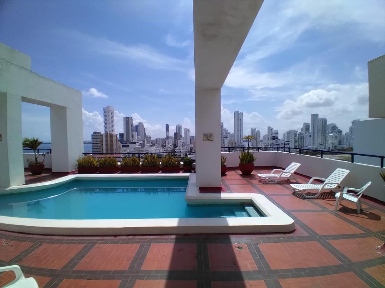 APARTAMENTO DE 3 ALCOBAS H-8MR CERCA AL MAR CON PISCINA AIRE ACONDICIONADO Y WIFi