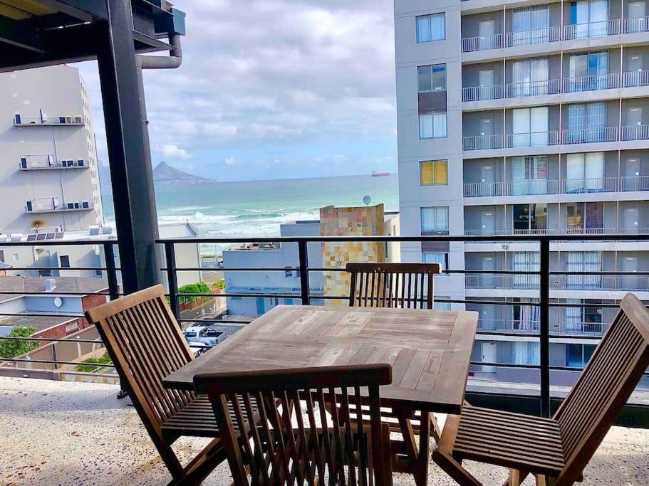 Top floor apartment by the beach