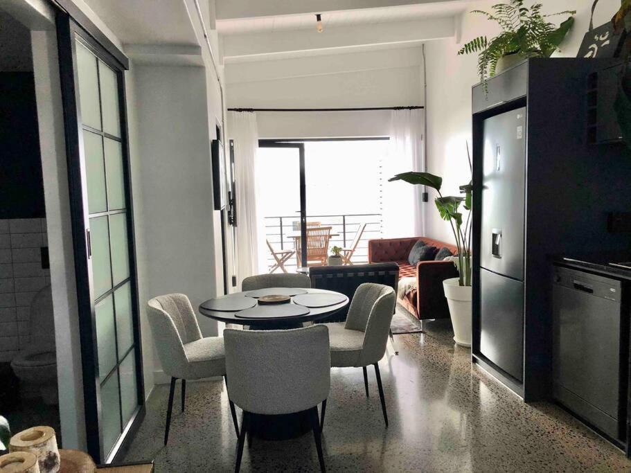 Top floor apartment by the beach