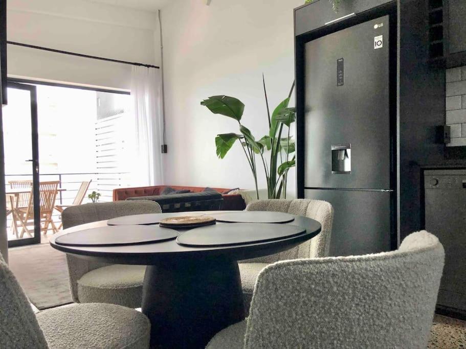 Top floor apartment by the beach