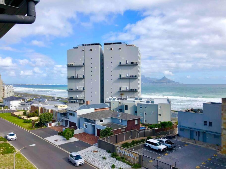 Top floor apartment by the beach